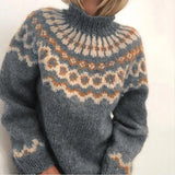 Gray knitted sweater with a pattern on a white background