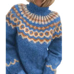 Blue knitted sweater with patterned collar on a white background