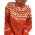 Red knitted sweater with a pattern on a white background
